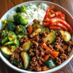 Spicy Ground Beef Stir-Fry Bowl with Garlic Veggies & Steamy Rice